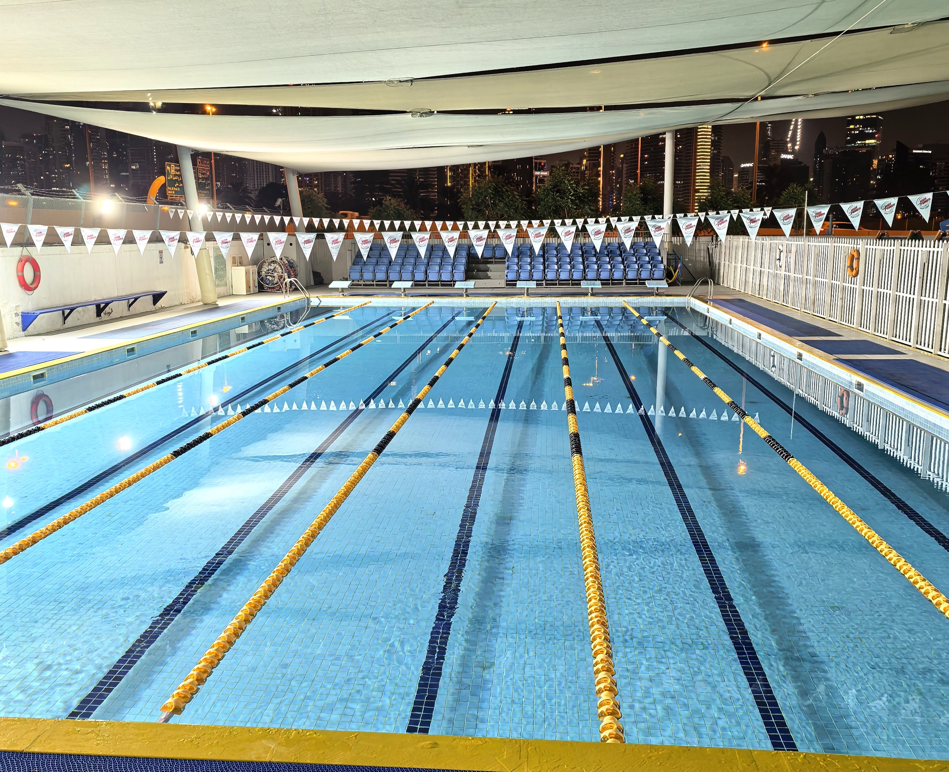 High Power Sports pool rental lanes at night in Dubai