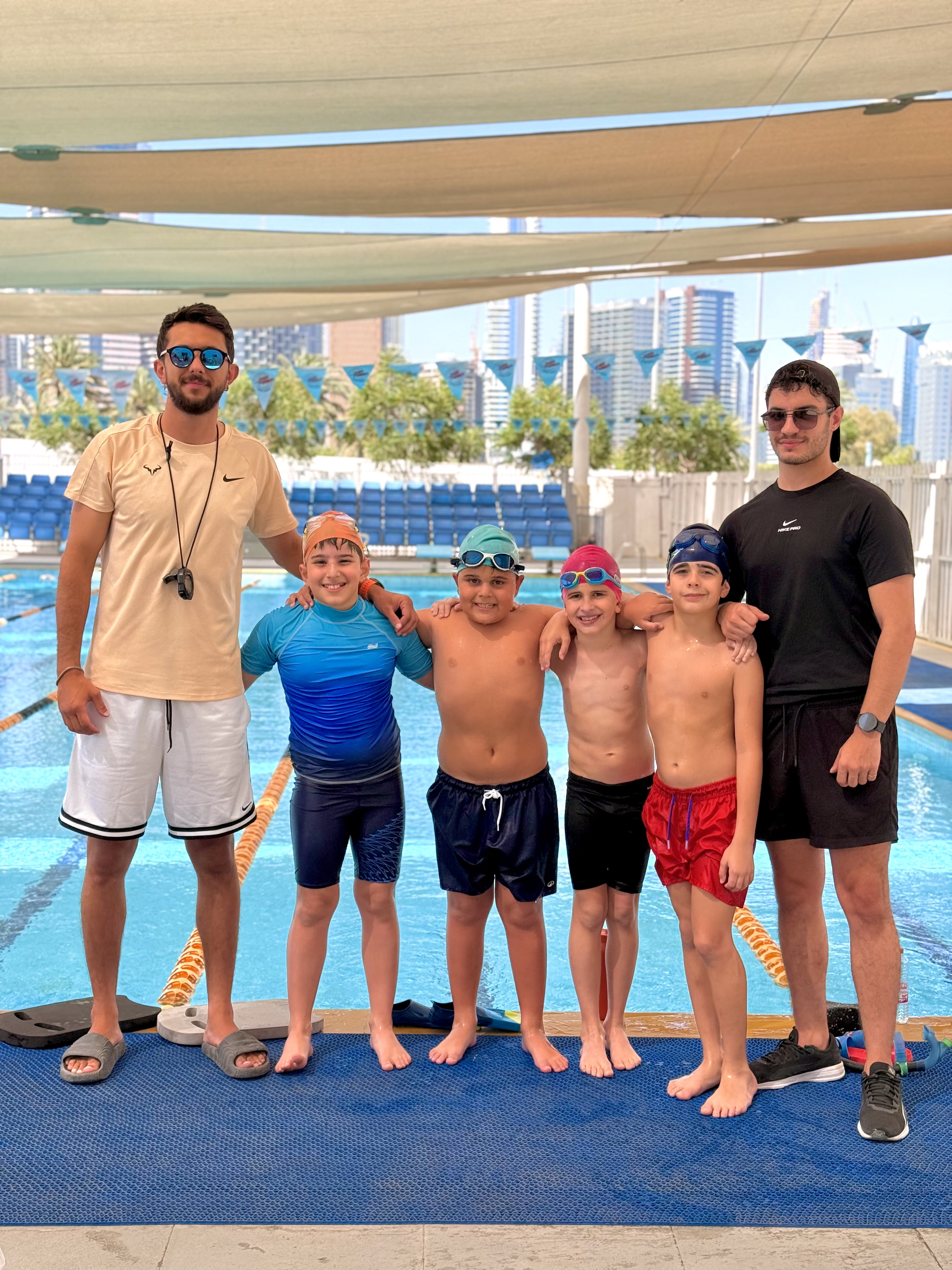 High Power Sports swimming academy coaches with young swimmers