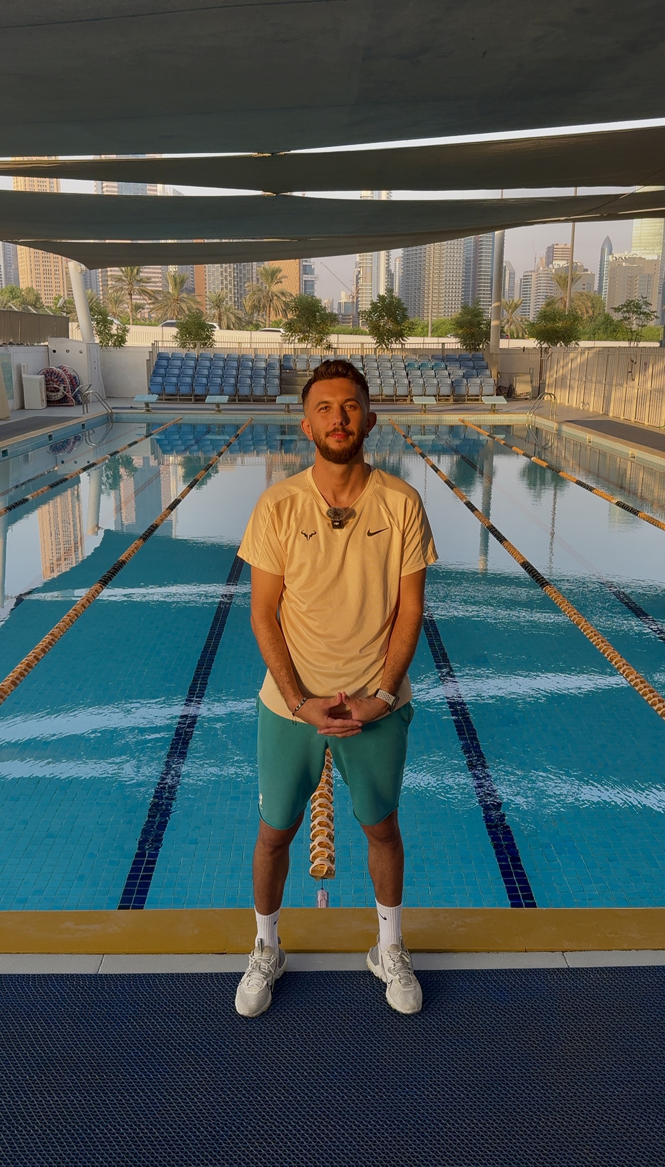 High Power Sports swimming coach by the pool